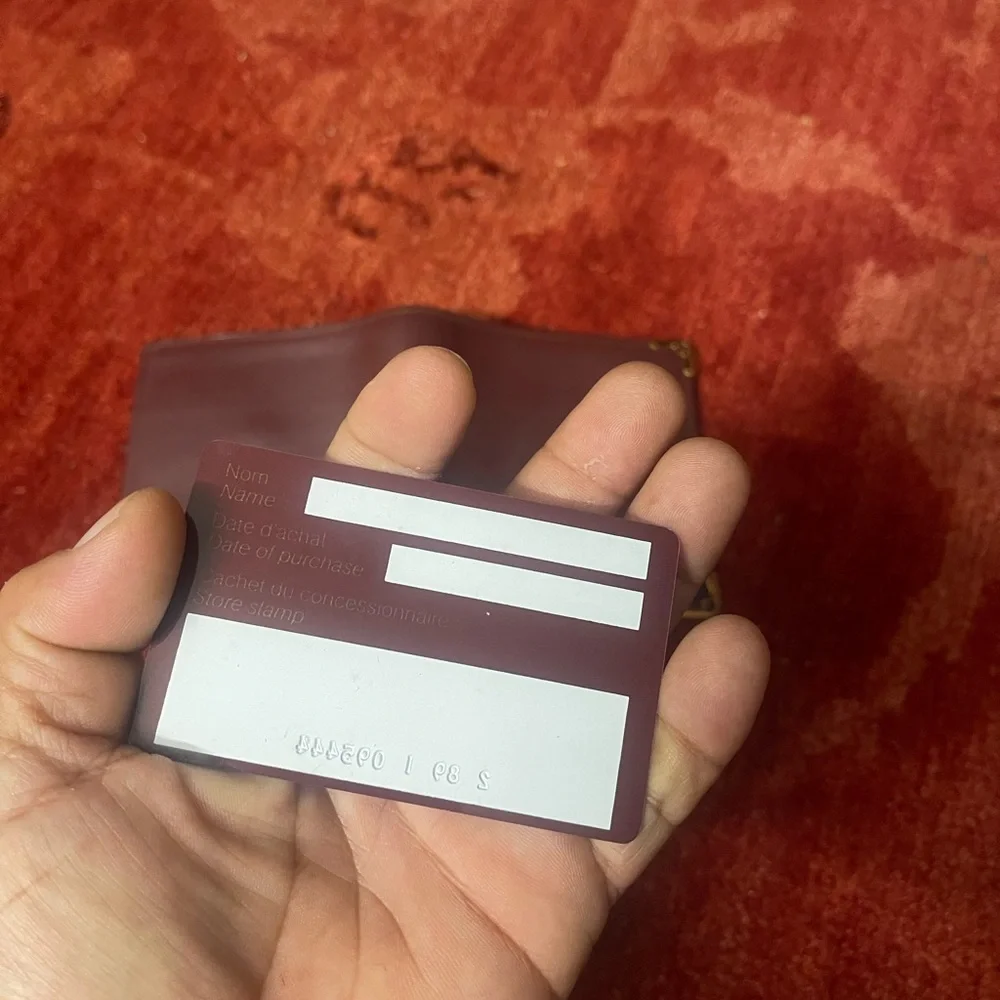Cartier Bordeaux Red leather wallet vintage square bifold compact.
